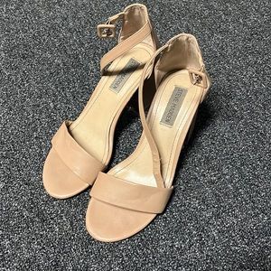 Nude Steve Madden Heels with gold accent on heel.